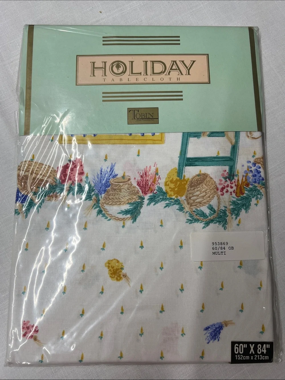 Tobin Holiday Tablecloth — White with Yellow, Blue, Pink & Green bunny Accents